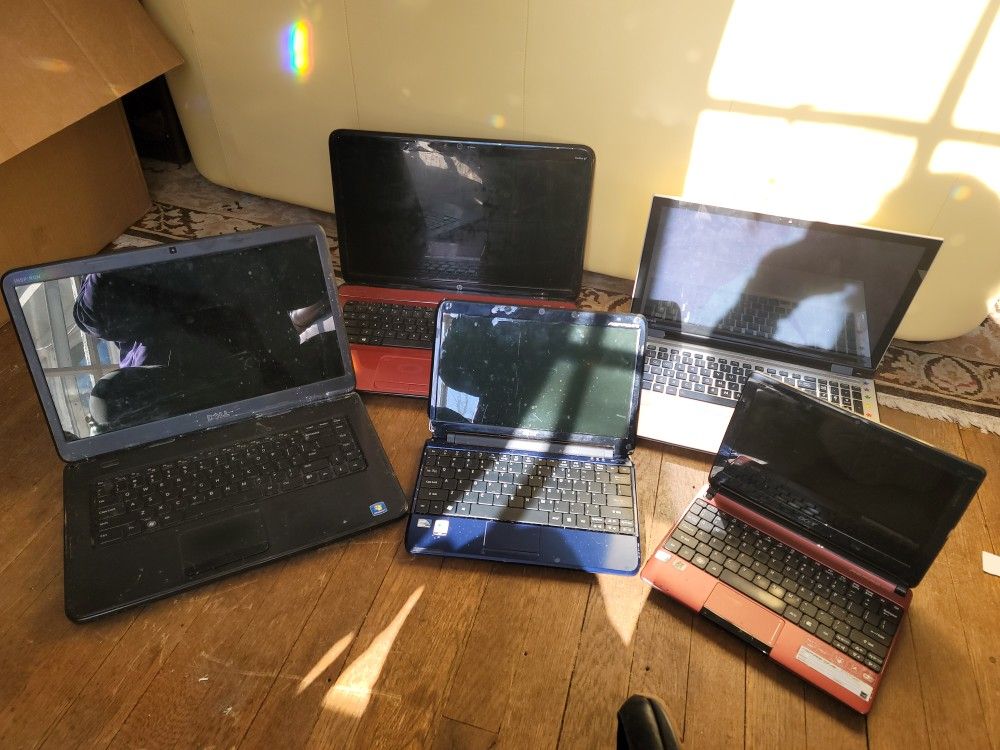 5 laptops for parts as is