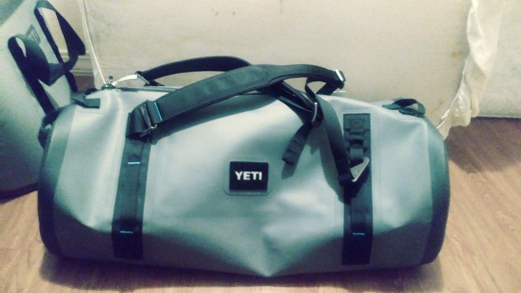 Brand new mens. Panga 75 Yeti airtight, waterproof, submersible backpack/duffle bag