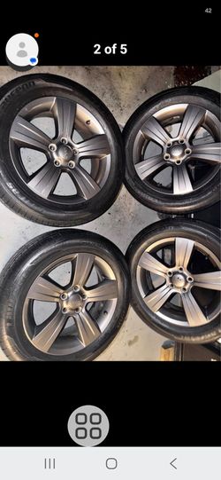 Jeep Pilot 17 inch Rims and Tires OEM in excellent shape,  Lug pattern 5x114.3mm