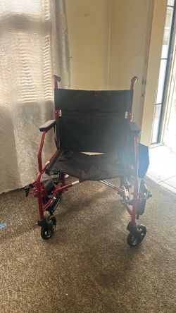 Red Transport Wheelchair with Footrests