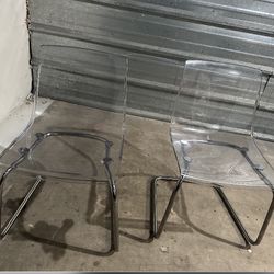 2 Clear IKEA Chairs 