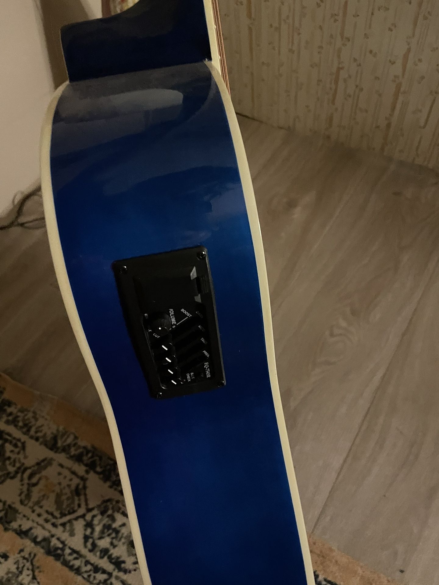 blue and black guitar