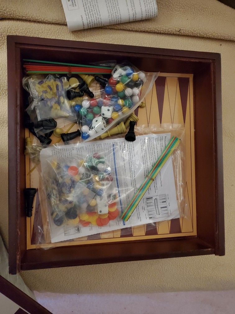Board Games Includes Ten Games And They Store Inside Of Checkered Board