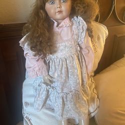 Antique Reproduction Doll.