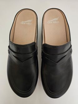Dansko Women's black leather clogs