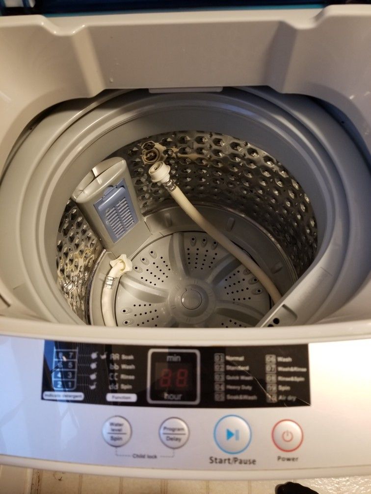 PANDA AUTOMATIC WASHING MACHINE AND MAGIC CHEF COMPACT DRYER