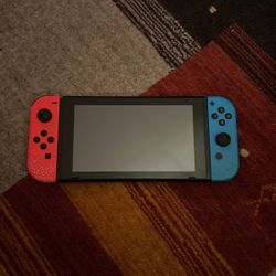 Nintendo Switch w/ Mario Cart & Party 