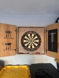 Dart board with cabinet