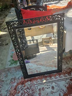 CAST IRON FRAMED MIRROR
