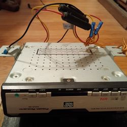 Power Acoustik(in dash D.V.D. player+wires)