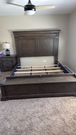 Nice king size bed with cedar chest foot boards, dresser, nightstand, and lamp from living spaces