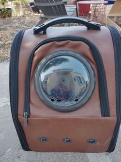 over the shoulder Cat or small dog backpack.
