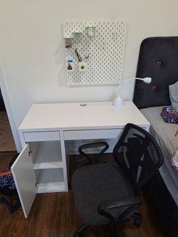 Table, lamp, chair and wall organizer