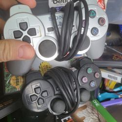 2 Sony Playstation 2 Controllers 1 Black And 1 Silver 