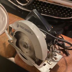 2 1/2 Electric saw,$30.00, Mechanical Outside lamp And Bench  Press 
