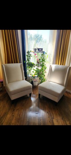 2 white chairs