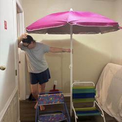 beach umbrella with two chairs 