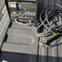 Power wise 36volt charer, DC ammeter gauge and a fuse replacement notice. The charger is labeled '36 Volt Battery Charger' 