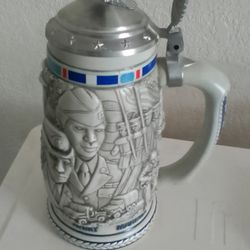 1990 Tribute to The American Armed Forces Stein $20 firm (lower valley)