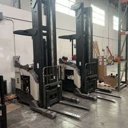 (2 Available) Crown RR Series Electric Stand-Up Rider Reach Trucks
