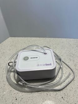 Open box Dr. Noze Best NozeBot, a hospital-grade electric nasal aspirator