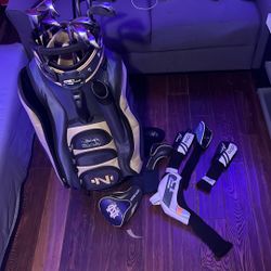 Team Golf Bag (with clubs and tops and alot of balls and brand new glove)