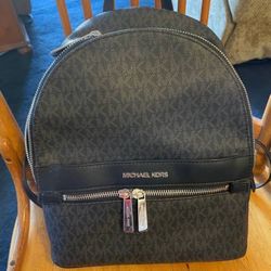 Micheal Kors MK Black Monogram Leather Backpack In Excellent Condition