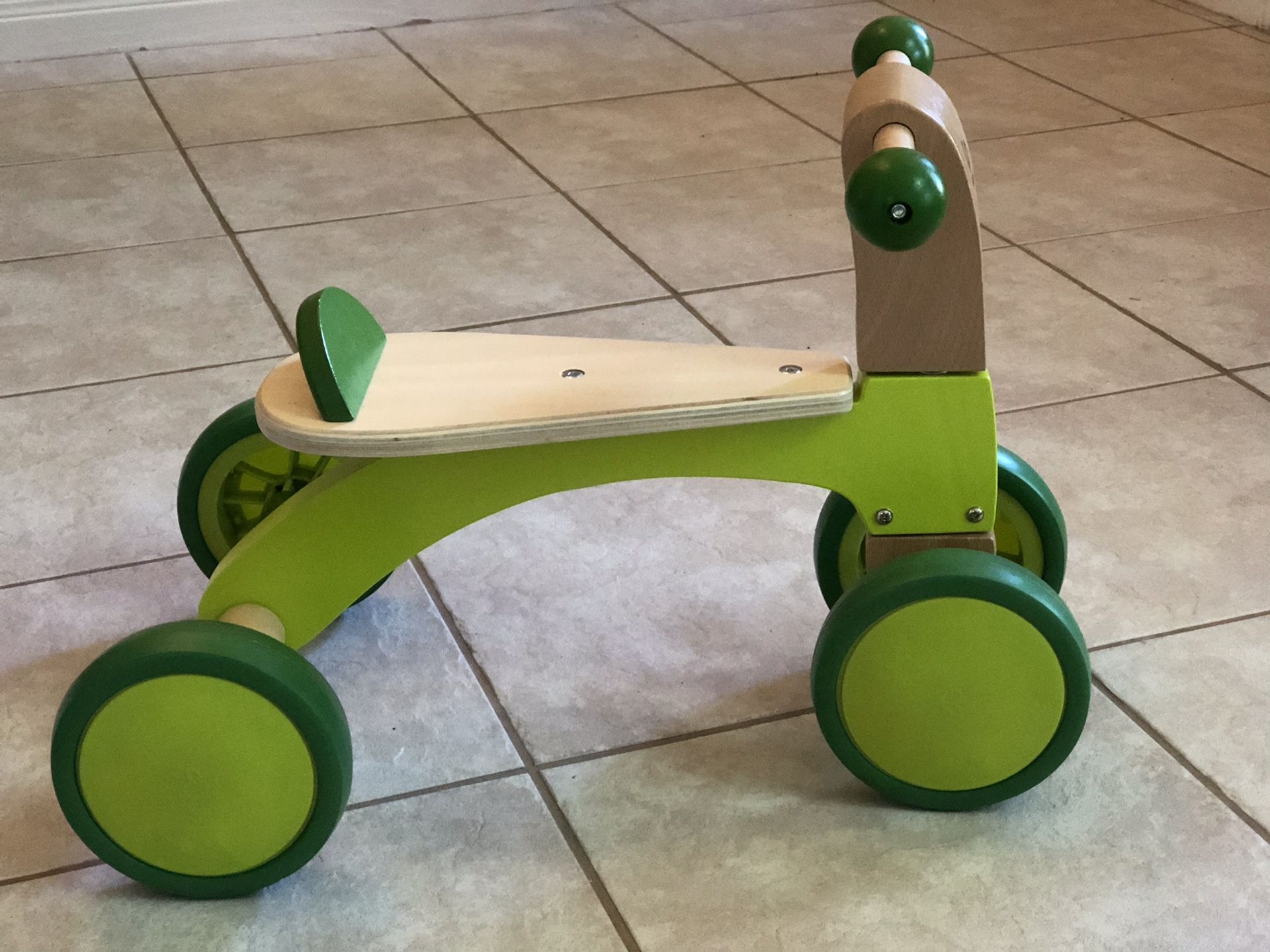 hape scoot around ride on wood bike