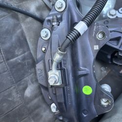 OEM Brembo front brake setup from a 2016 Chevrolet Camaro SS.