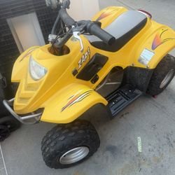 Kids' ATV—I don't know if it works, as I don't have the key. 