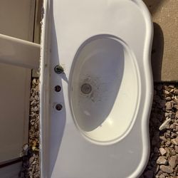 Vintage Restroom Vanity And Roman Tub Faucets