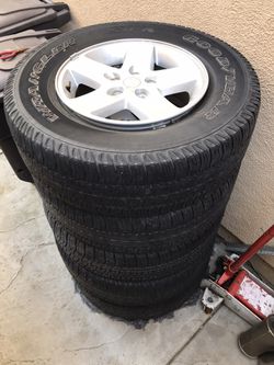 2015 Jeep stock wheels with tire set of 5