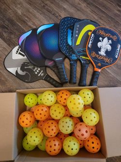 Used Pickleball paddles and balls