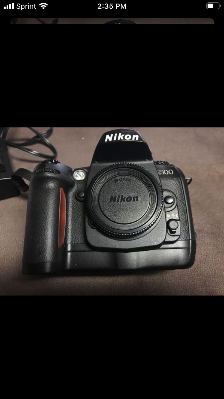 Nikon D100 with lens and charger.