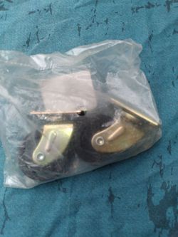 Set of Waxman  1⅝ Black Roller Caster Plate  Wheels