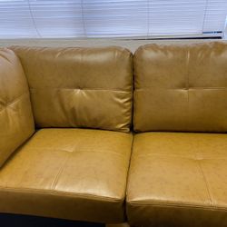 Ginger color sectional with storage ottoman