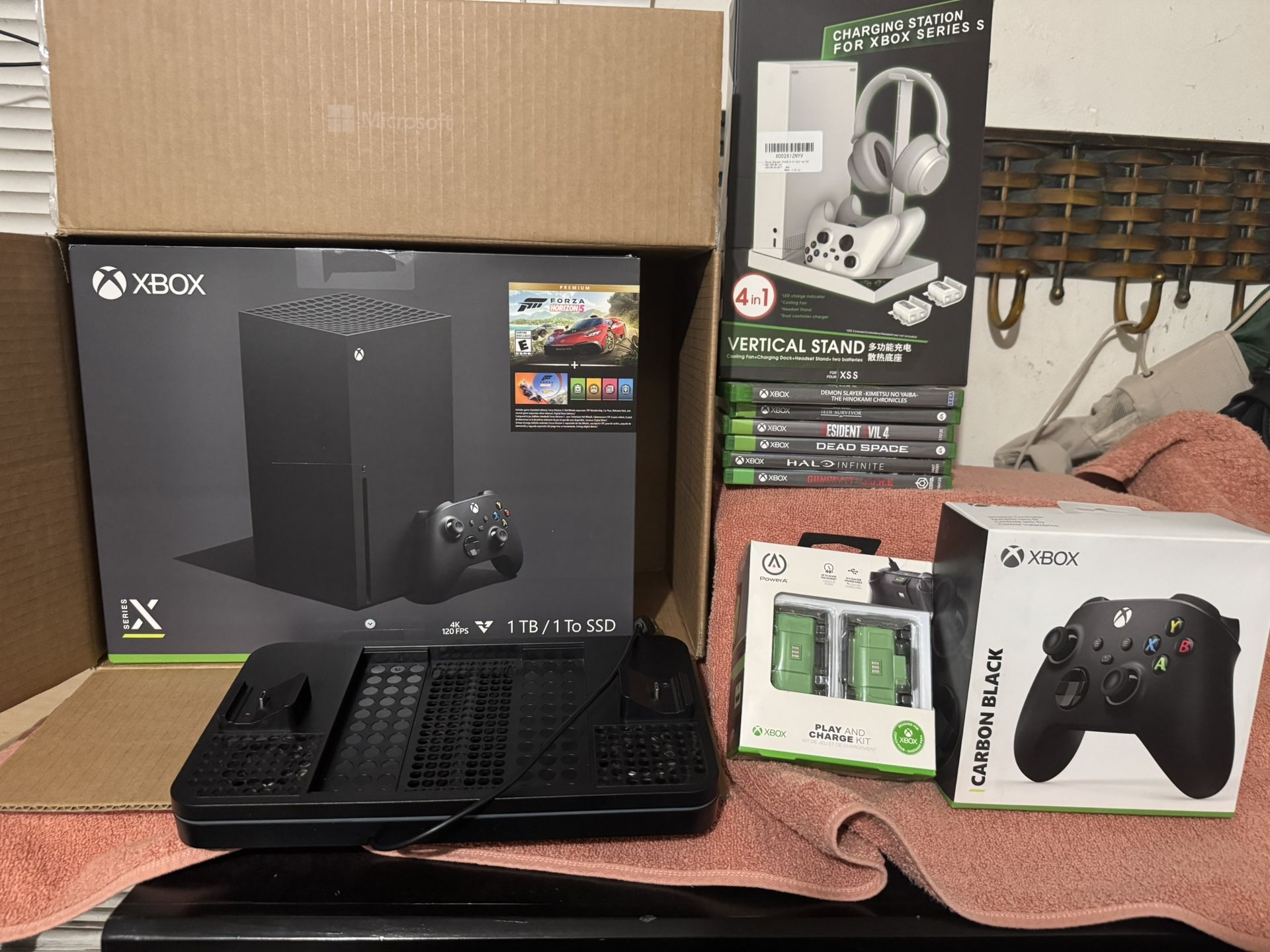 X-Box X And All Accessories Included Along With Games, Cooling Systems Included, Rechargeable Batteries Extra Controller, Stand, System Still Brand N