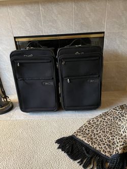 2 Matching 22” Kirkland Signature 2-Wheel Roller Bags