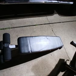 Cap. Barbell slant board.