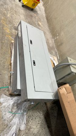 Two Electric Panels With Breakers