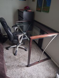 Glass metal and wood desk and chair included.There are 2 of them.