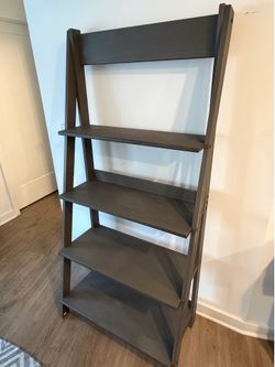 Ladder-style grey wood bookshelf