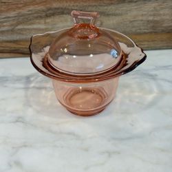 Vintage pink Depression era glass candy jar W/flared rim and a matching lid