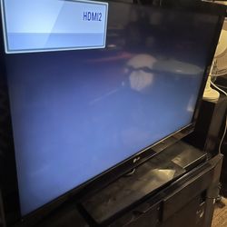 42 Inch TV With Stand