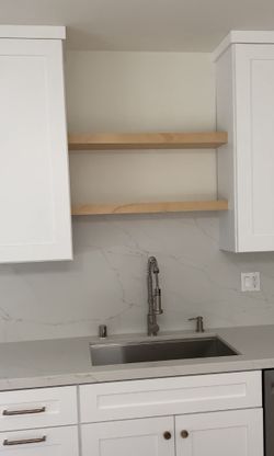 custom floating shelves and cabinets