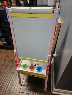 All in one kids easel with chalk, magnetic whiteboard, and paper roll.