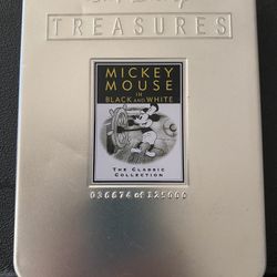 Mickey Mouse in black-and-white two CD series. Walt Disney Treasures. The classic collection. Open box but never ran/used.  Small dent on tin - front 