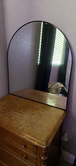 Black frameless mirror