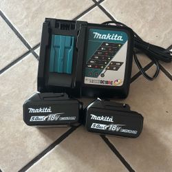 Makita Charger And Two Batteries Brand New