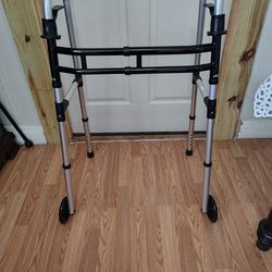 Senior walker with wheels